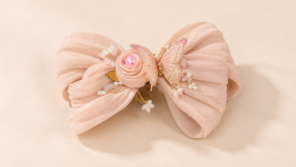 Delicate pink bow with pearl accents