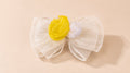 Elegant fabric bow with yellow accent